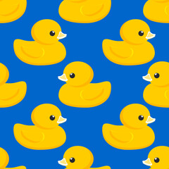 Yellow rubber duck. Seamless cute pattern with blue background for decorative textiles, modern fabrics. 