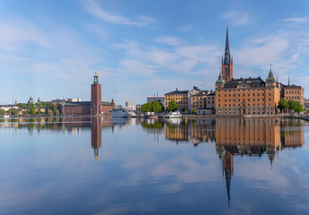 The island Riddarholmen with court houses and the Town City Hall in the background a sunny summer...