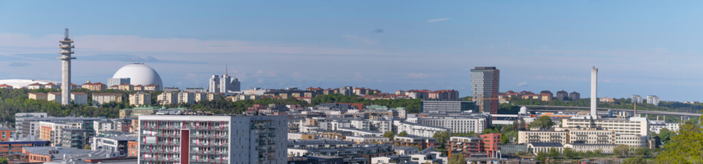 Panorama view over the district Södra Hammarby and the Globe, Davicii arena a sunny summer day in...