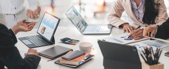 Cropped shot of diverse coworkers working together in boardroom, brainstorming, discussing and...