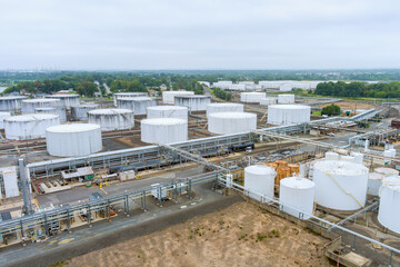 Aerial industrial zone view of storage crude oil tank petroleum factory