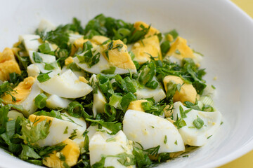 close-up egg salad in a white plate