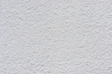 White background, plaster texture on the wall