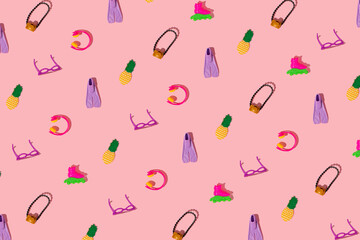 Creative pattern is made of women's accessories on pink background. Minimal summer travel concept. Pop art.