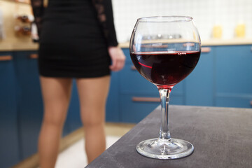 glass of wine is on the table