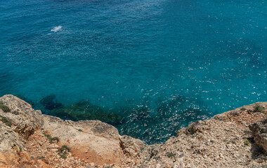 blue sea and cliff rocks at mallorca spain