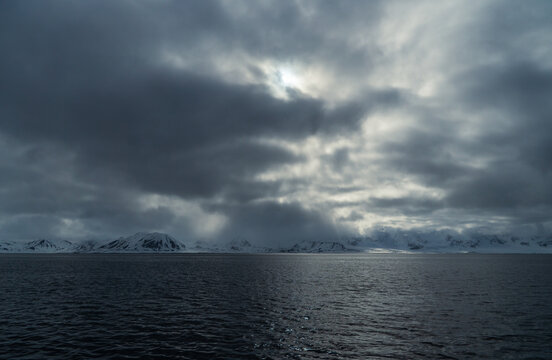 Dramatic arctic landscape in Svalbard. In the foreground the Greenland Sea.