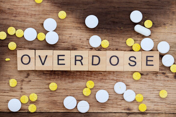 the concept of wooden beams with overdose inscriptions is used for information on the dangers of illegal drugs