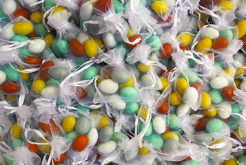 large amount of colorful sugared almonds for a wedding