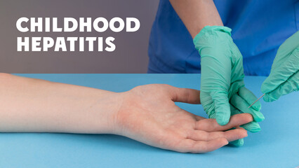 Childhood Hepatitis disease concept. Doctor draws blood for analysis of Hepatic for children test...