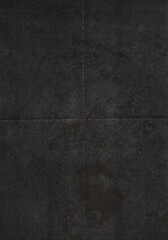 Texture of folded paper with dark toner ink and dirt, top view or detail scan of dark paper, cool...