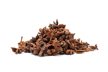 Heap of dried star anise isolated on white background. spot focus.