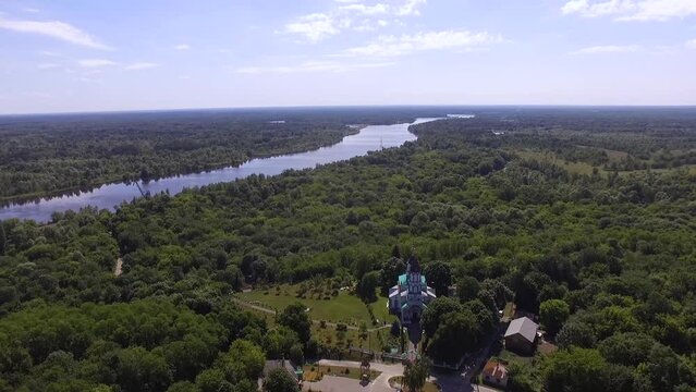 Aerial view. Orthodox Church in the thickets of the city of Chernobyl. 