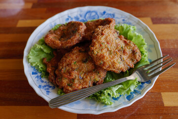 Thai Fish cake serve with sweet sauce.