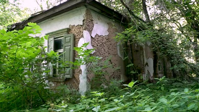 Abandoned Ukrainian traditional house in the wilds of Chernobyl. Chernobyl city. Ukraine