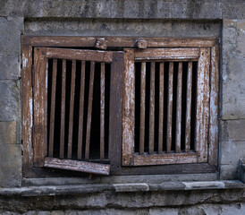 Fototapeta na wymiar Wooden shutter window on concrete building