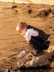 Kid near the water