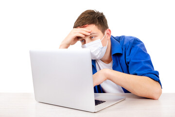 Sick Young Man with Laptop