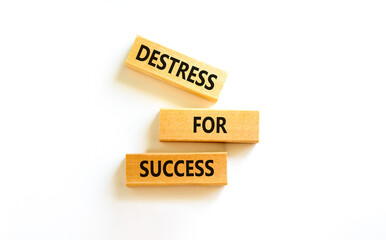 Destress for success symbol. Concept words Destress for success on wooden blocks. Beautiful white background. Psychological business and destress for success concept. Copy space.