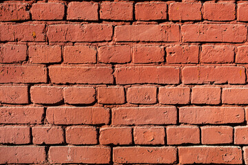 solid wall of red brick laid horizontally
