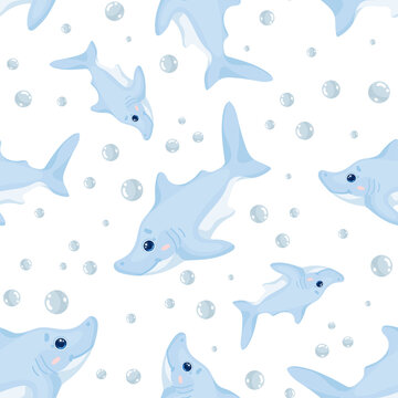 Seamless pattern with little cute sharks.Cartoon vector graphics.