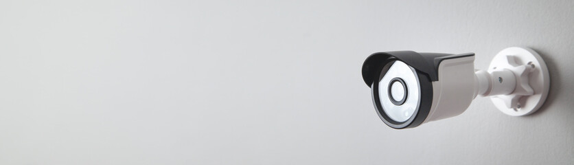 Security camera on background. Space for your text