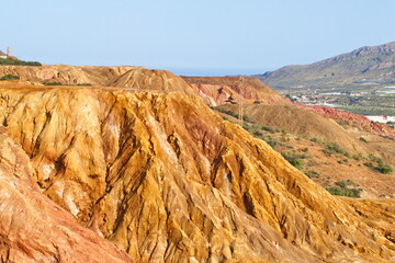 Arid landscape of the old Roman open-pit mines of Mazarrón, in Murcia, now abandoned