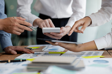 Fototapeta premium Business man group are meeting together in the office, they are meeting on the topic of finance and financial management, they are business partners. Concept financial management for startup companies