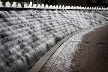 Water falling on the steps of the fountain in triangle park in Lexington, Kentucky