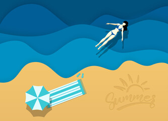 Fototapeta premium Woman swims on beach. Girl on vacation on beach.