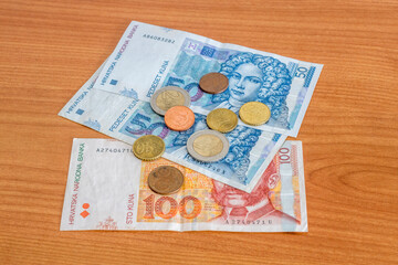 Croatian kuna HRK banknotes and Euro coins.