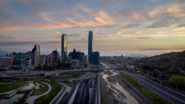 Santiago of Chile, view of the bicentennial park and some of its emblematic buildings in a timelapse hyperlapse shortly after sunset