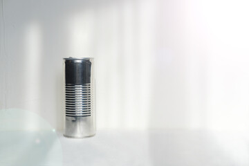 Tin can stand on a white background
