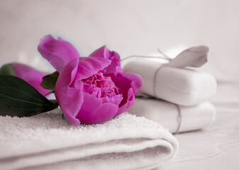 Solid soap, peony flower on a light background