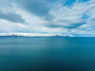 Beautiful Icelandic nature during summer time and sunny weather. Magical Iceland with green mountains, fields and waterfalls.
