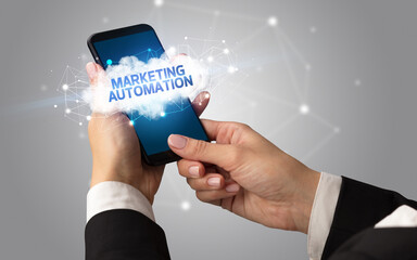 Hand using smartphone with cloud business concept