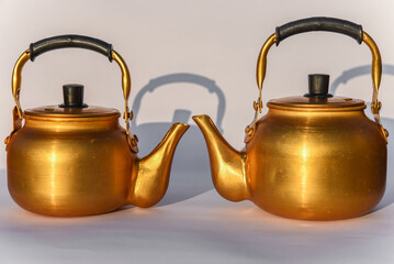 Copper desert tea pot, antique metal teapot isolated on white background, antique kettle, golden...