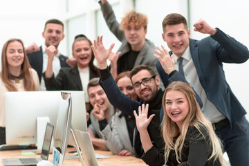 portrait of a happy business team at an office Desk