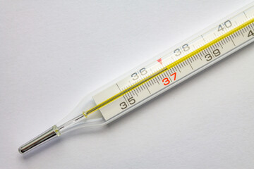 Thermometer isolated on the white background Medical thermometer shows the temperature. Temperature 37 Isolated image
