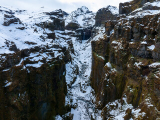 Aerial view of the glaciers and snowy mountains near Jokulsalon lagoon in Iceland.