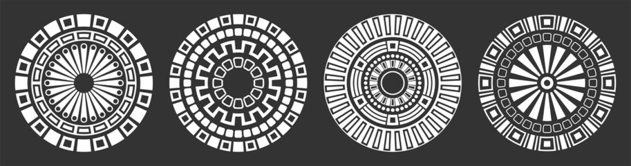 Set of four abstract circular ornaments. Decorative patterns isolated on black background. Tribal ethnic motifs. Stylized sun symbols. Stencil tattoo and prints Vector monochrome illustration.
