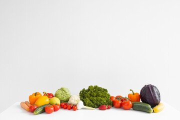 Fototapeta na wymiar Panorama of fresh vegetables and fruits on white background.