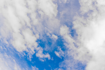 Beautiful white clouds on a bright blue background.