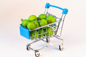 Basket (cart) with grocery apples.