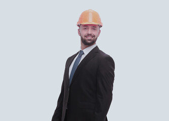 side view.businessman in helmet looking at copy space.
