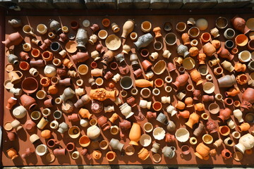 a jug is a decorative product made of clay from a master of firing dishes made of natural material 