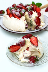 Homemade cake Pavlova with strawberries on top