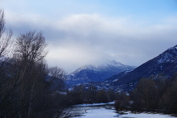 The river in the mountains during winter