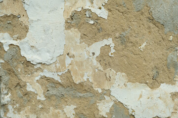 The background is old plaster, concrete, clay. The texture of the old wall. Space for text.