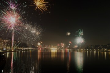 Fototapeta premium fireworks over the river in Copenhagen Denmark 